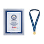 co-branded Guinness World Records RPC certificate in frame with gold medal on a white background