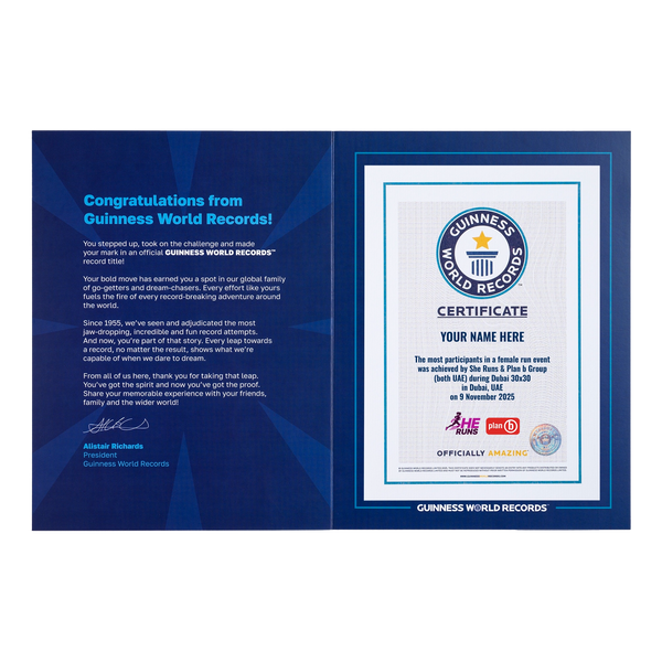 co-branded Guinness World Records RPC certificate with She runs on a white background