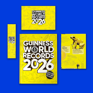 Guinness World Records 2026 book on a blue background with poster, bookmark and postcard